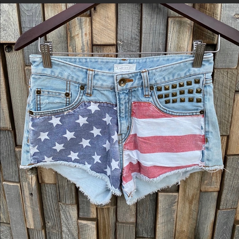Woman’s size small flag denim jean shorts grommets